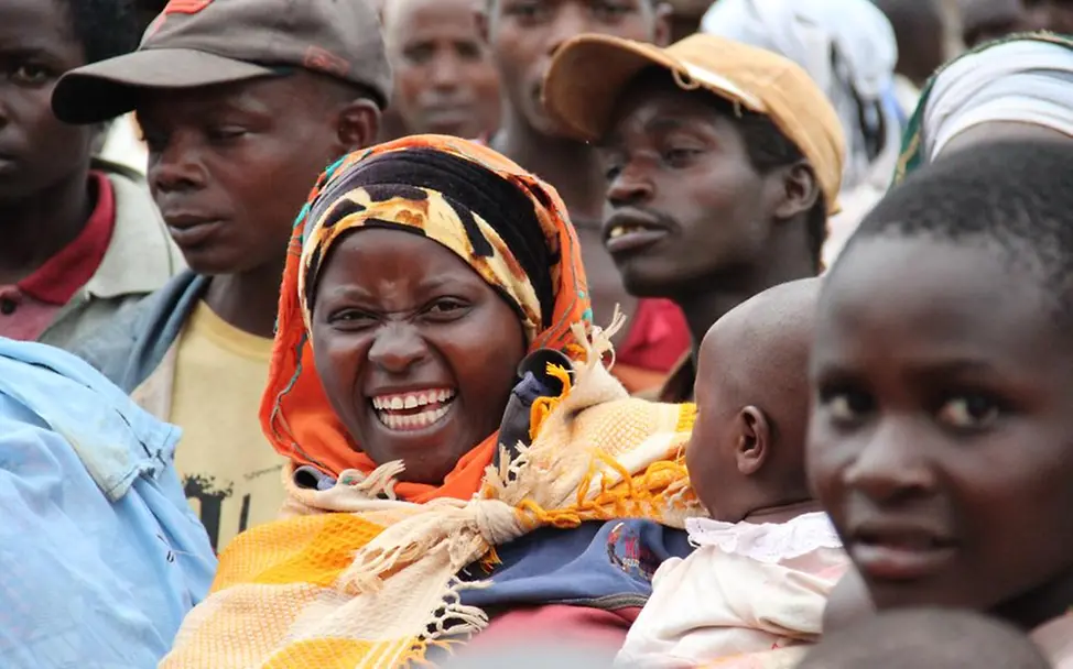 Begegnung in Ngozi Burundi Frau Lachen UNICEF