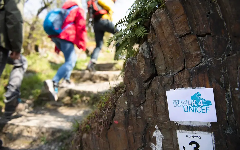 WALK4UNICEF: Wanderweg | © UNICEF/Etges WALK4UNICEF Logo und Wanderer