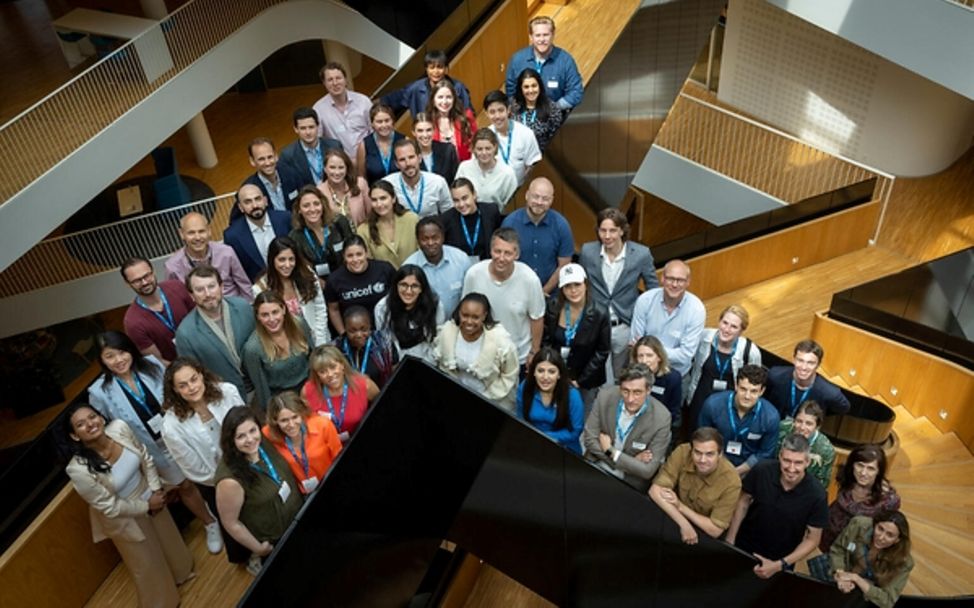 Kopenhagen: Ein Gruppenbild im Treppenhaus des global NextGen summit