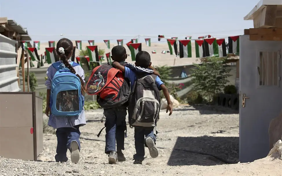 Schulkinder auf dem Weg nach Hause im Westjordanland. © UNICEF/Izhiman Schulkinder auf dem Weg nach Hause im Westjordanland. © UNICEF/Izhiman