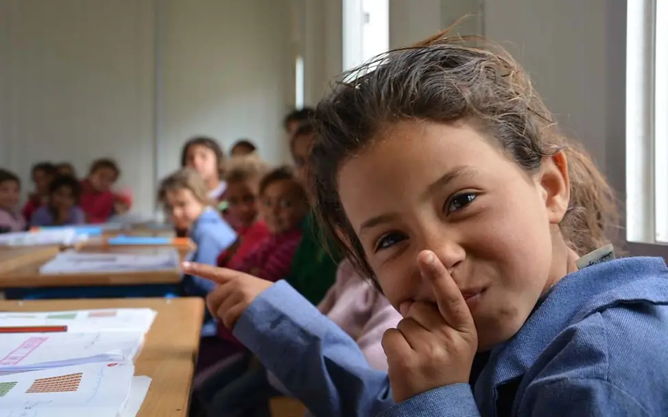 Syrisches Mädchen beim Unterricht im Za'atari Camp | © UNICEF Dt/Charbonneau Syrisches Mädchen im Flüchtlingscamp Za'atari